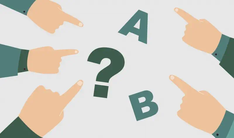 Hands pointing to letters